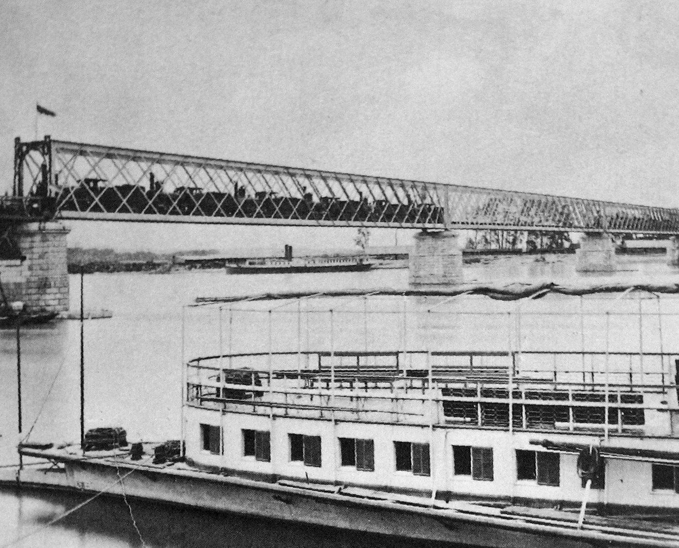 Historic 1872 proof load test of a railway bridge with rows of locomotives